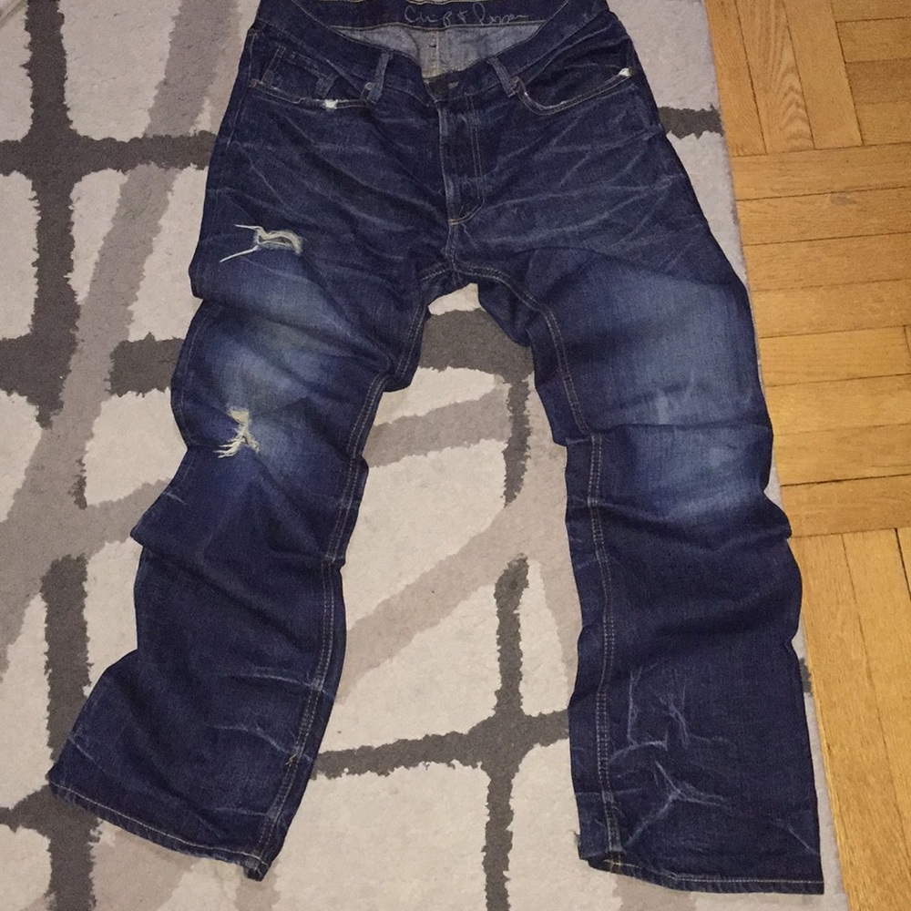 Chip and pepper distress jeans